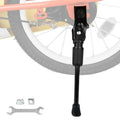 Black adjustable bike kickstand mounted beside the front wheel axle