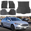 Black fitted rubber floor mats set with front and rear mats plus trunk liner, textured surface