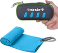 Blue microfiber camping towel rolled with compact zip pouch, held by hand