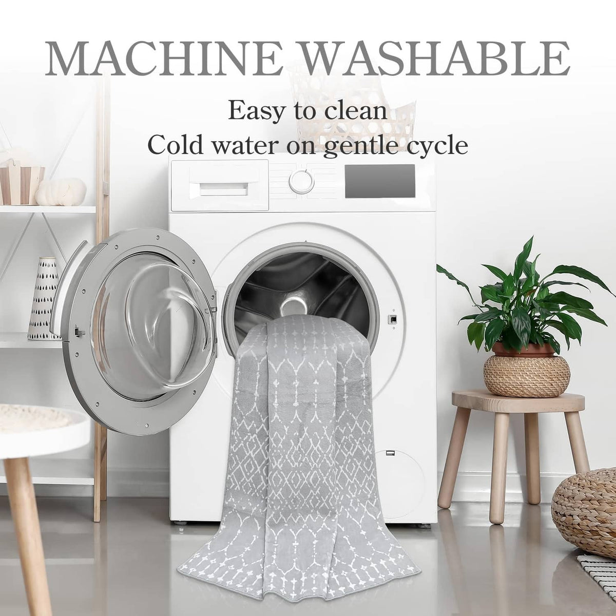 Washable grey round rug folded on washing machine display, white Moroccan pattern visible