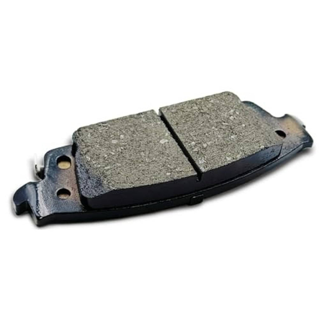 Ceramic brake pad with gray friction material and perforated metal backing
