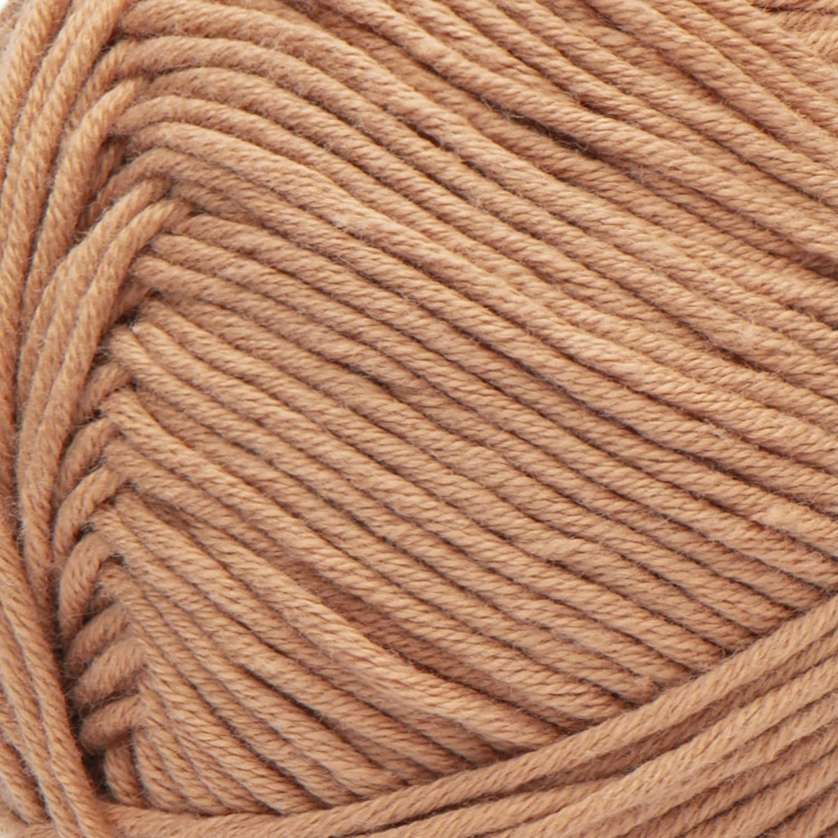 Close-up of light brown twisted yarn strands with smooth texture