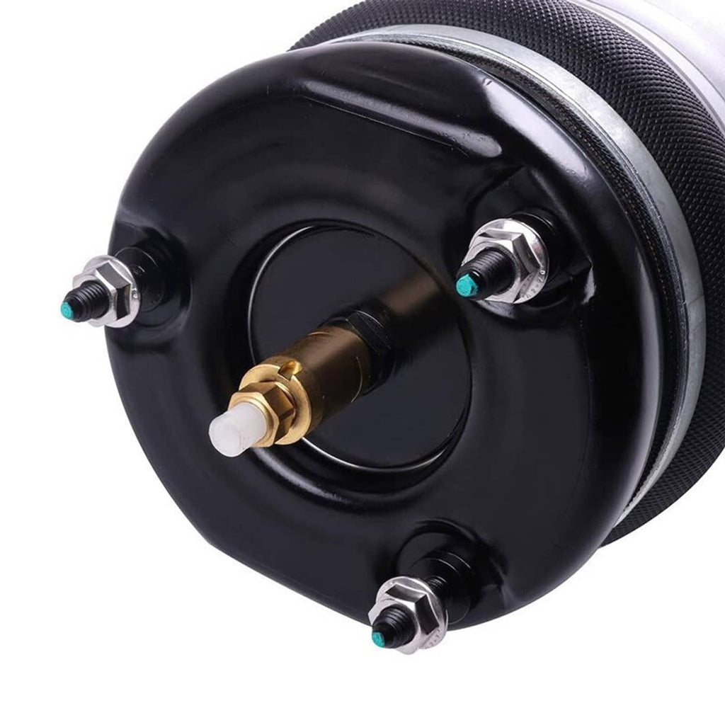 Close-up of air spring top plate on black housing with brass valve connector