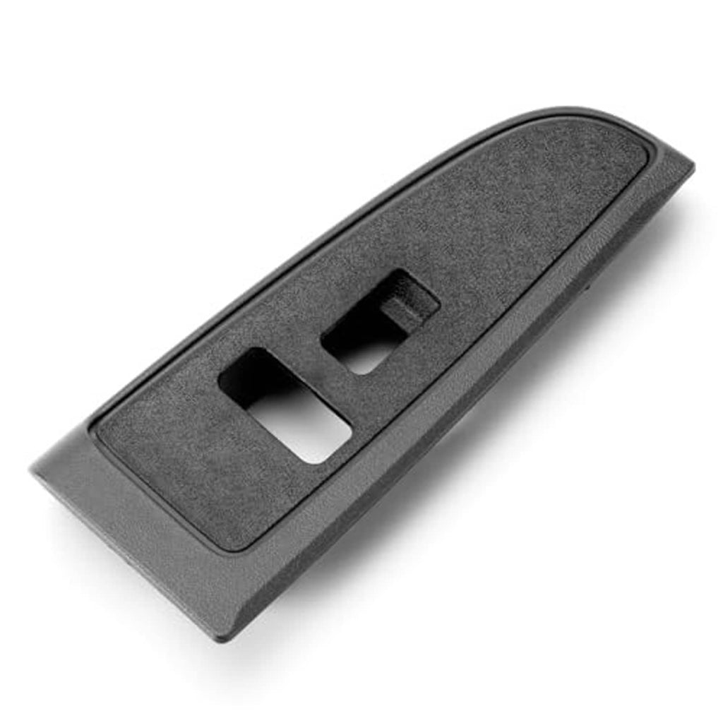 Window switch bezel cover, angled view of textured dark plastic with two openings