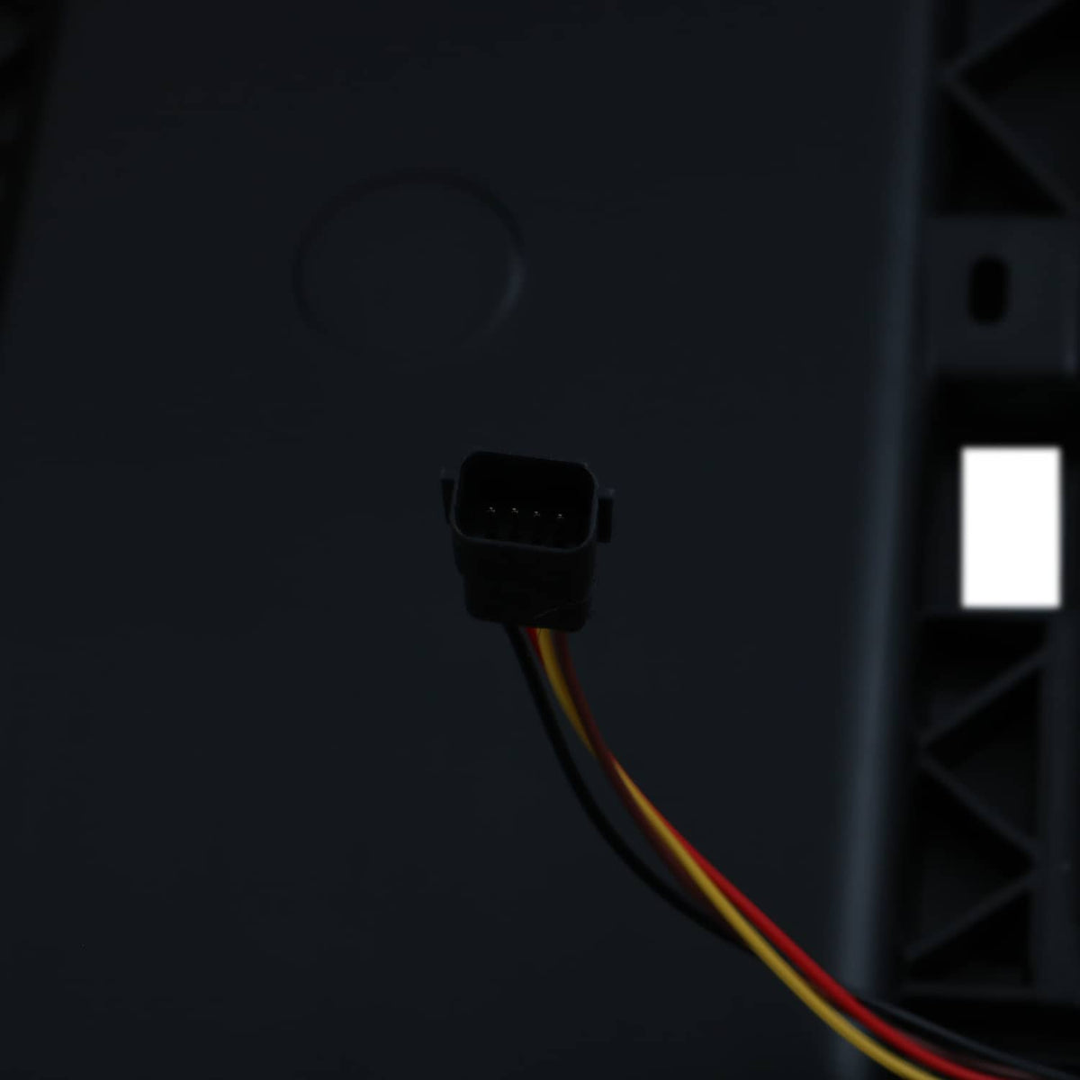 Air shutter motor connector with black wiring leads, radiator grille assembly