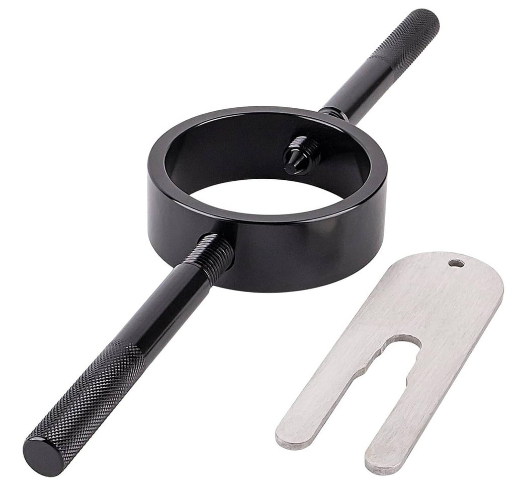 Motorcycle fork spring compressor ring tool with textured handle and silver fork oil gauge