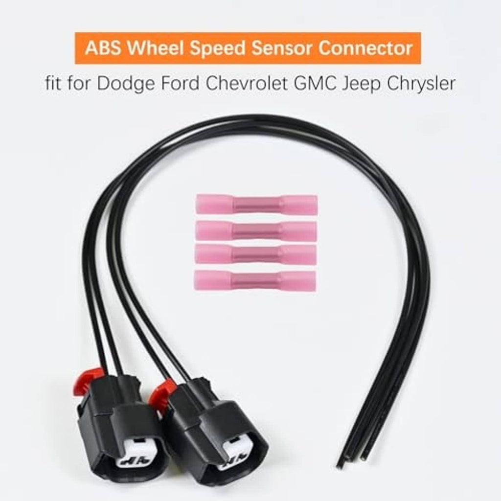 ABS wheel speed sensor connector pair with wiring harness leads and pink heat-shrink tubes