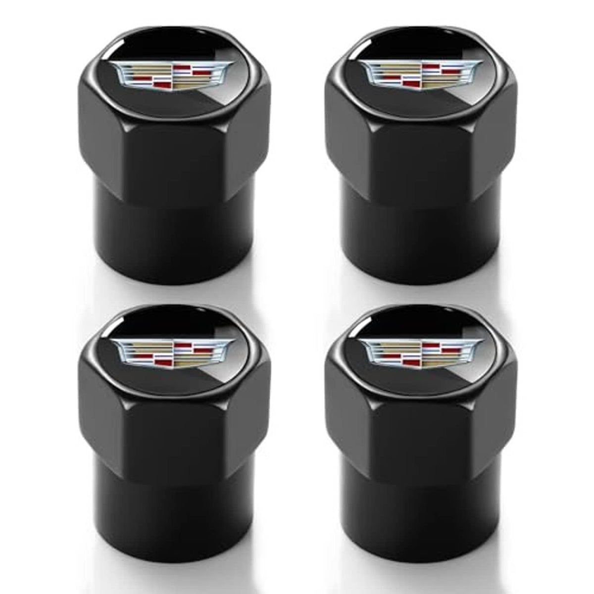 Set of four black metal tire valve stem caps with Cadillac emblem, chrome top