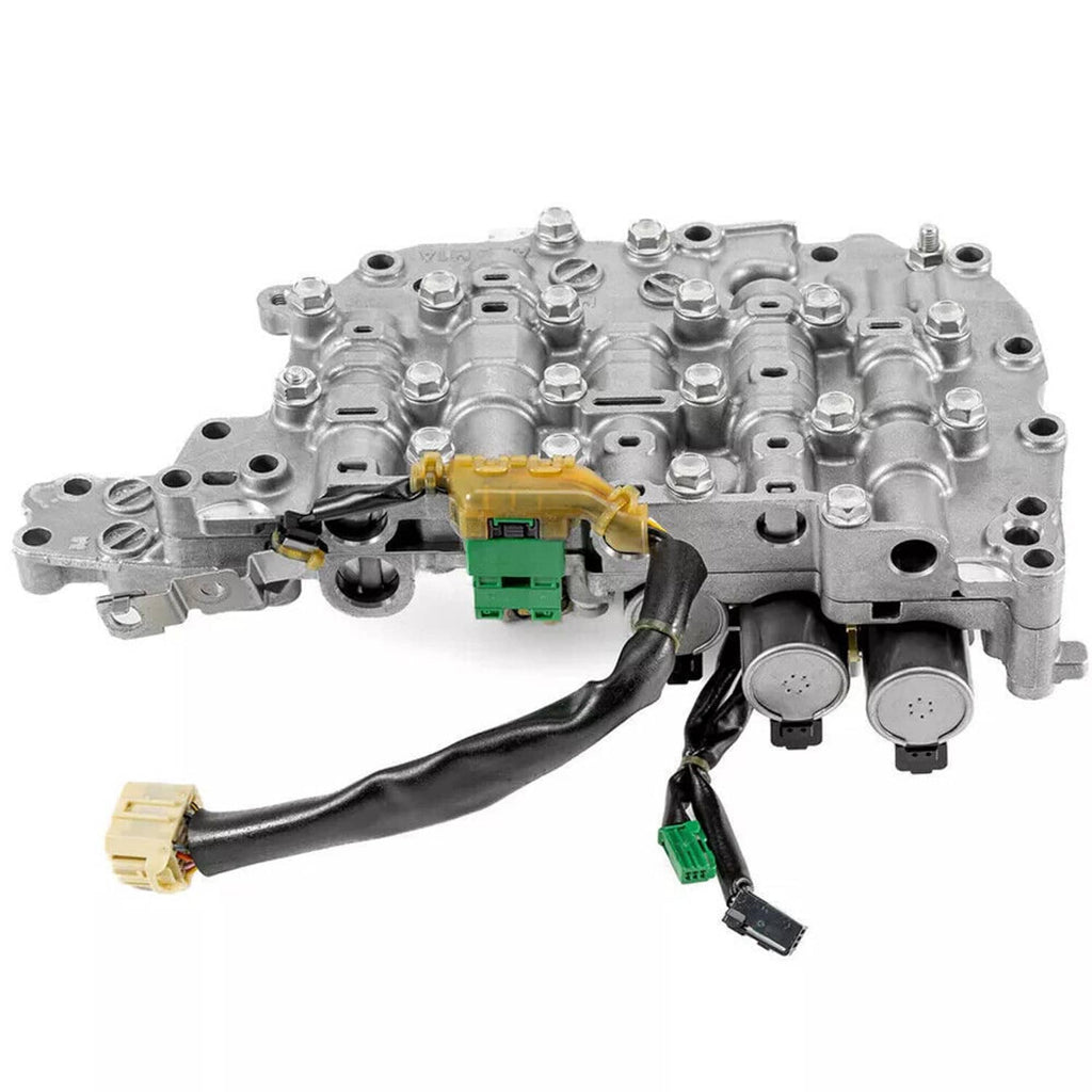 Transmission valve body with solenoids, wiring pigtails, and connector plugs on metal plate