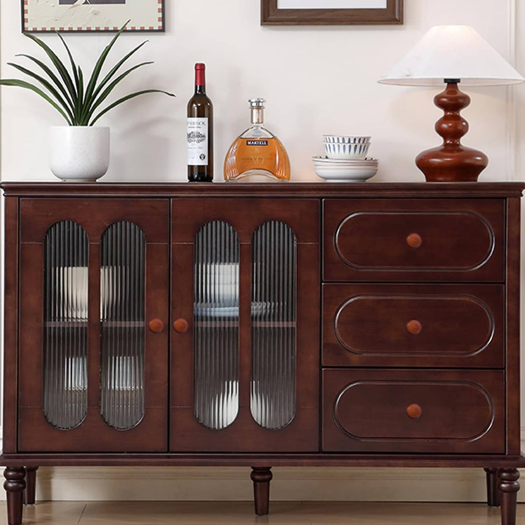 Brown wood dresser knobs on cabinet drawers, round domed mushroom pull shape