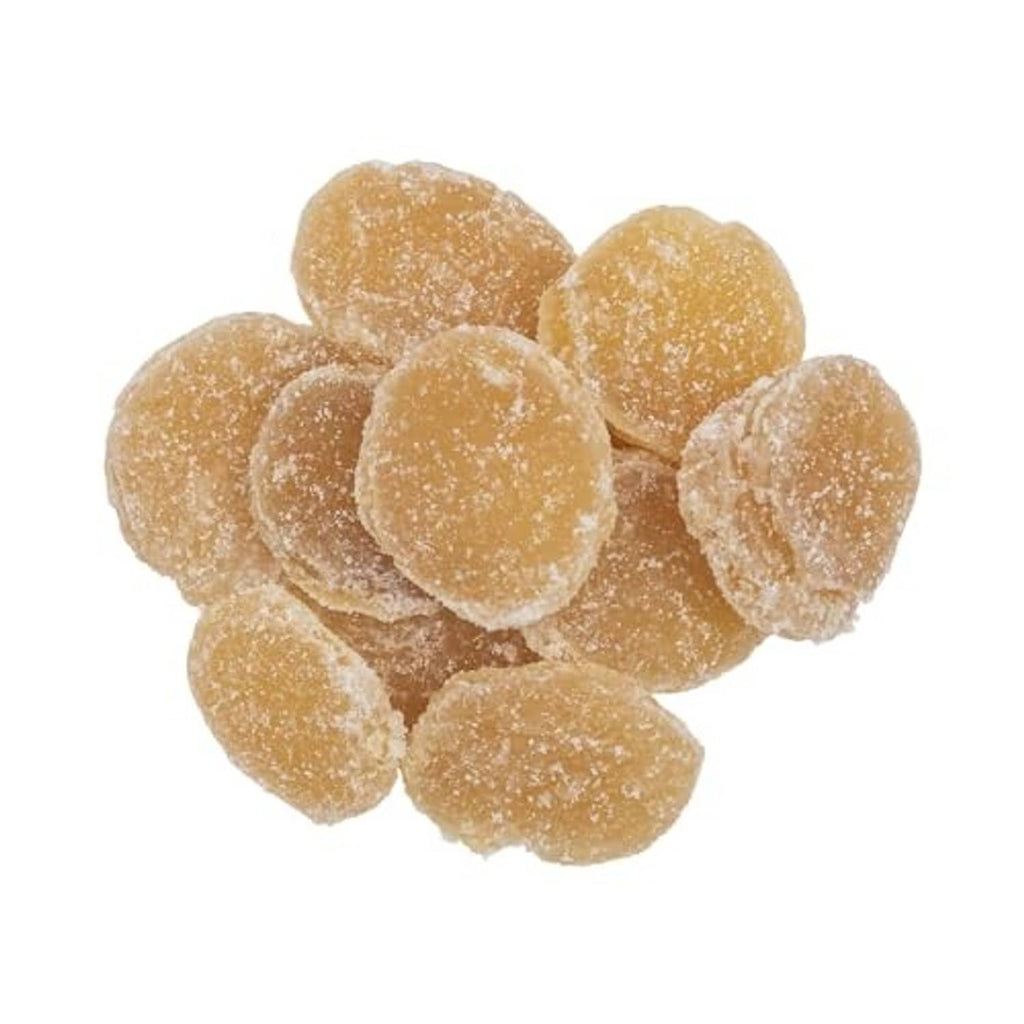 Crystallized ginger slices, golden candied pieces dusted with sugar
