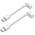 Pair of white USB-C to barrel plug power adapters with cable and connectors