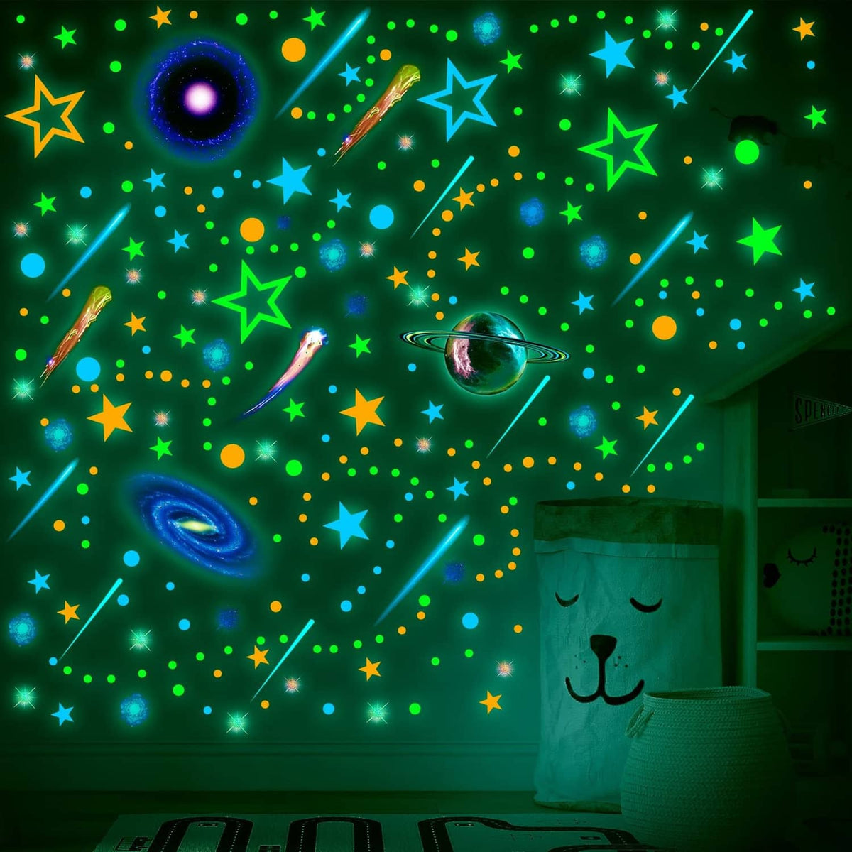 Glow-in-the-dark space wall decals with multicolor planets, stars, and dotted comet lines