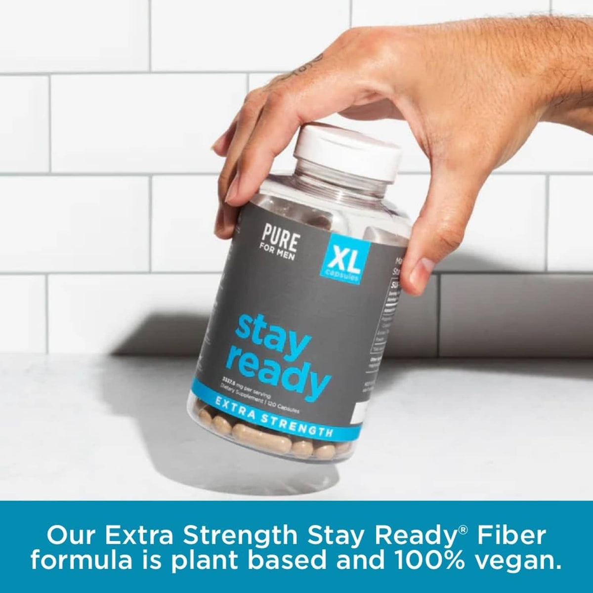 Stay ready extra strength fiber supplement bottle held in hand with XL capsules