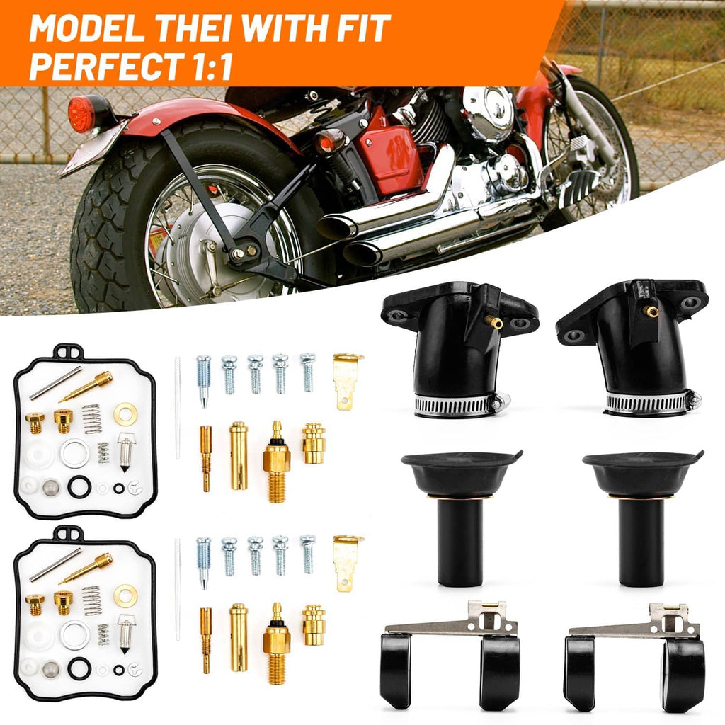 Carburetor rebuild kit components: two black intake manifolds, boots, and brass jet hardware