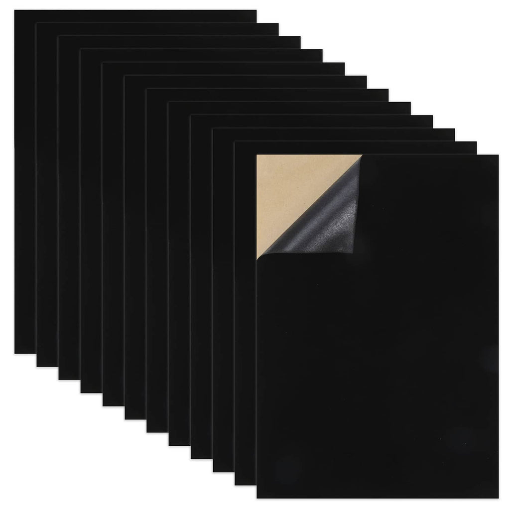 Set of black self-adhesive sheets with visible beige backing, stacked