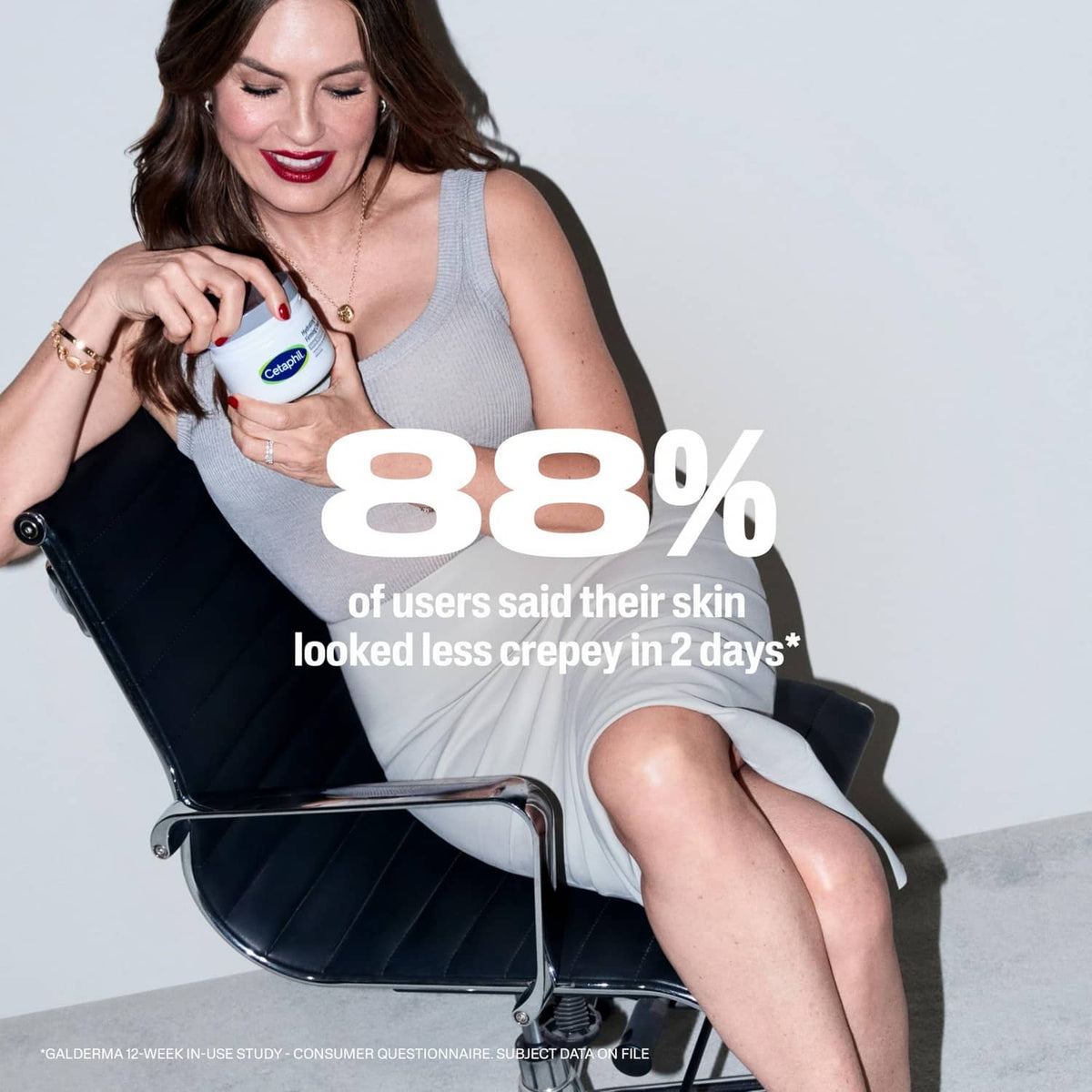 Woman holding a cream jar while seated; percentage callout for less crepey skin