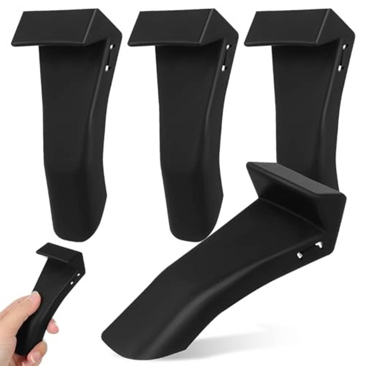 Black jaw clamp cover held in hand, contoured protective tire changer clamp cover.