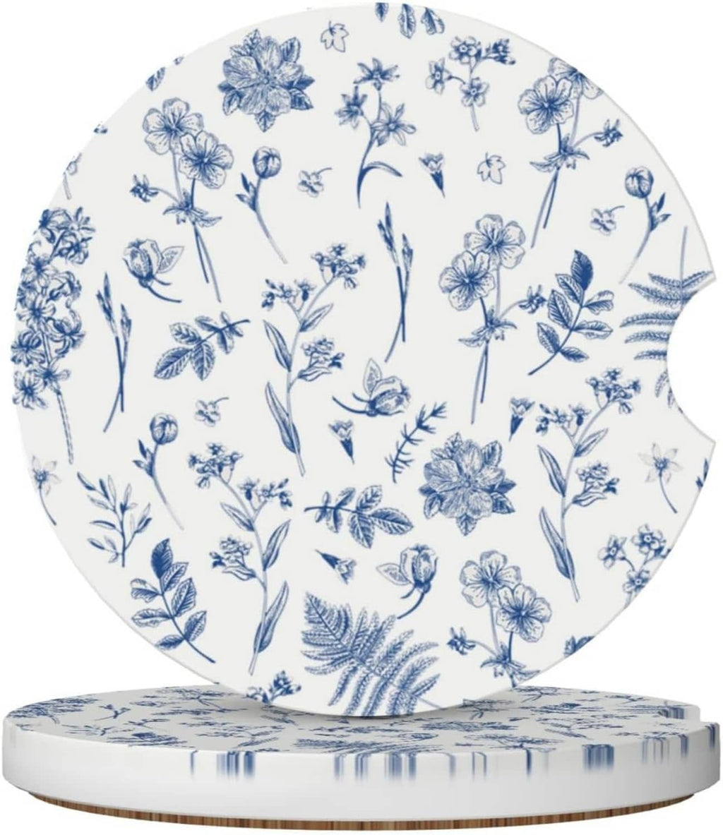 Round ceramic cup coaster with blue floral print on white base
