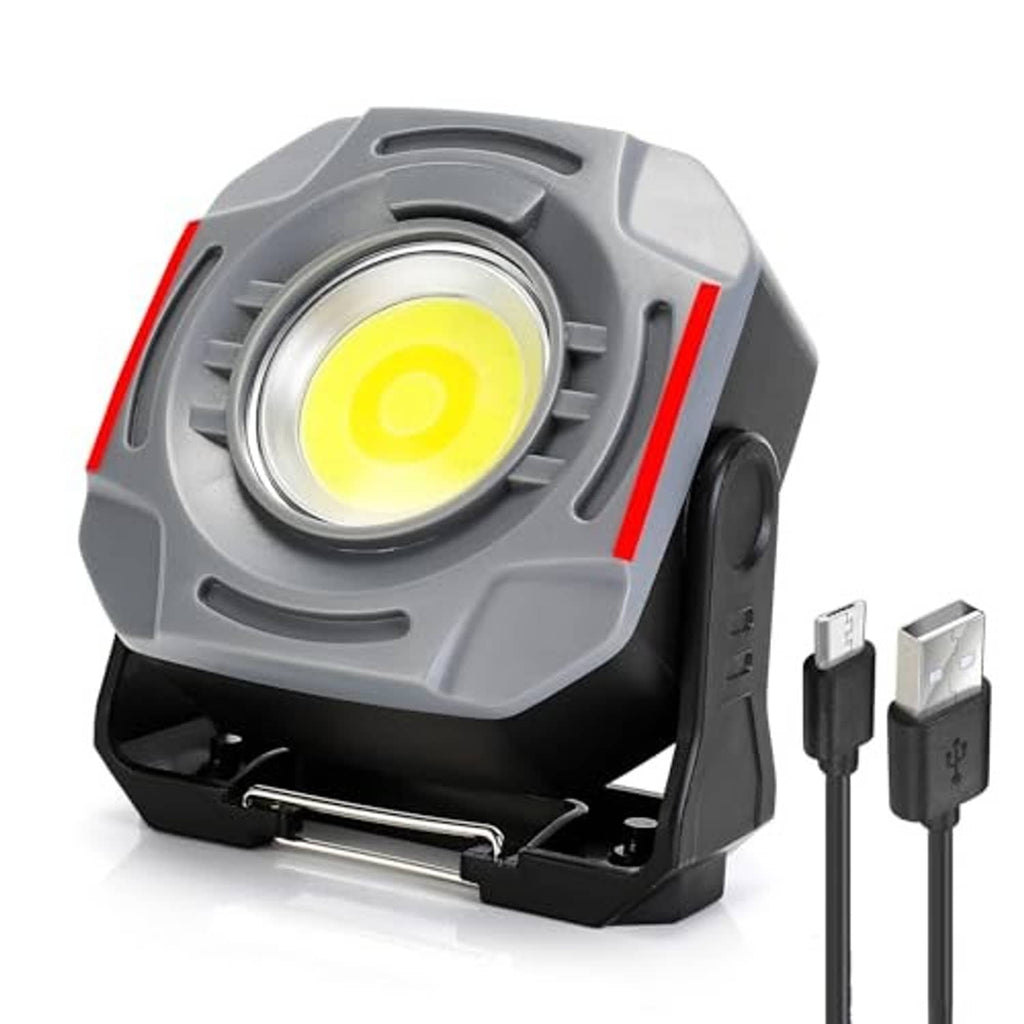 Rechargeable magnetic work light with hook, gray housing, LED on, side view with charging cables