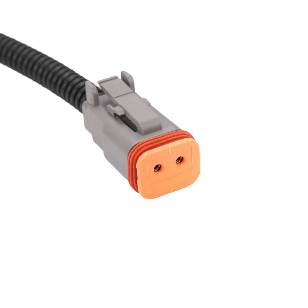 Gray wiring connector with orange plug end on black cable