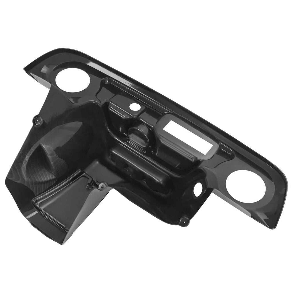 Carbon fiber style dash panel with radio opening and circular speaker openings, dark finish