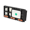 Black ignition control module with green indicator window and orange terminal pins