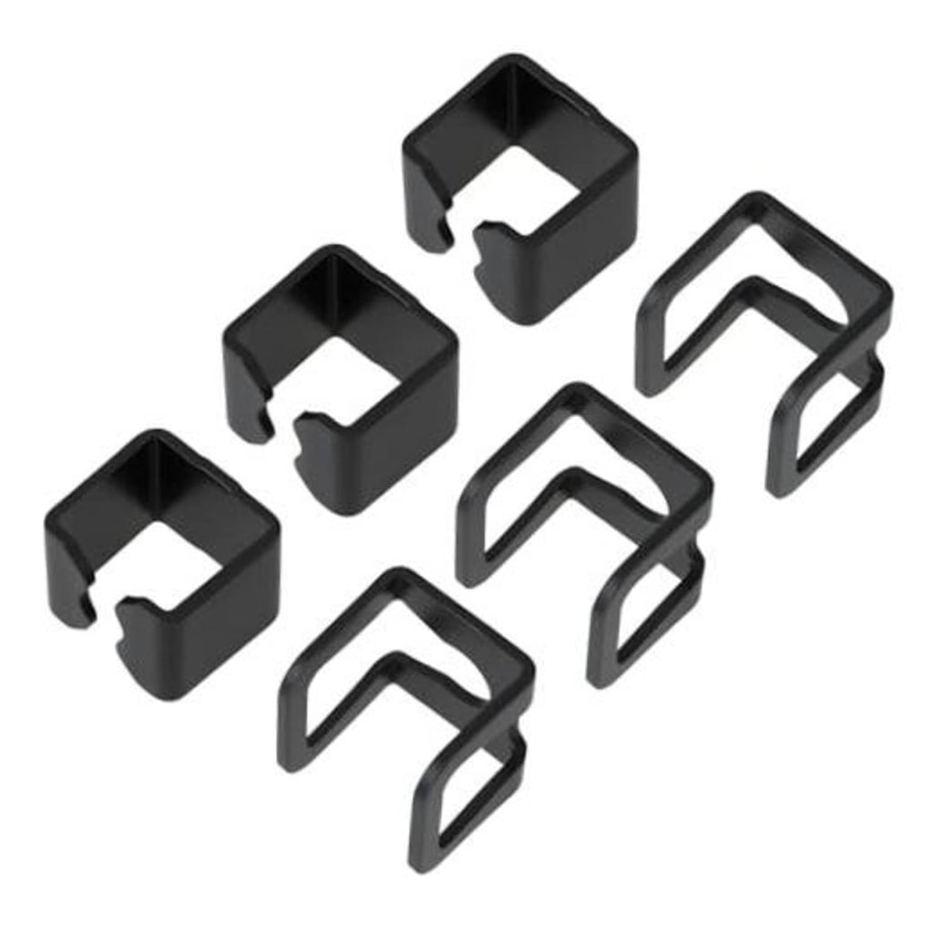 Set of six black U-shaped hydraulic jack spare parts with matching cutouts.