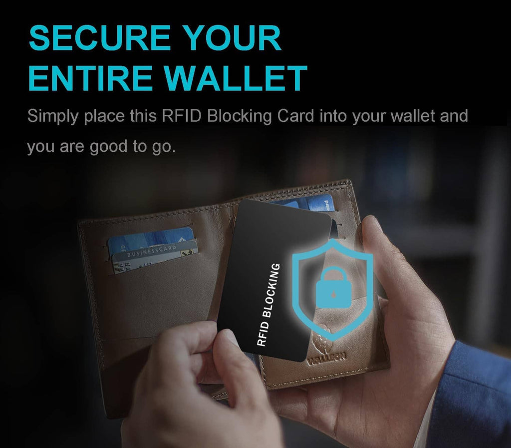 RFID blocking card held in a hand over cards in a wallet