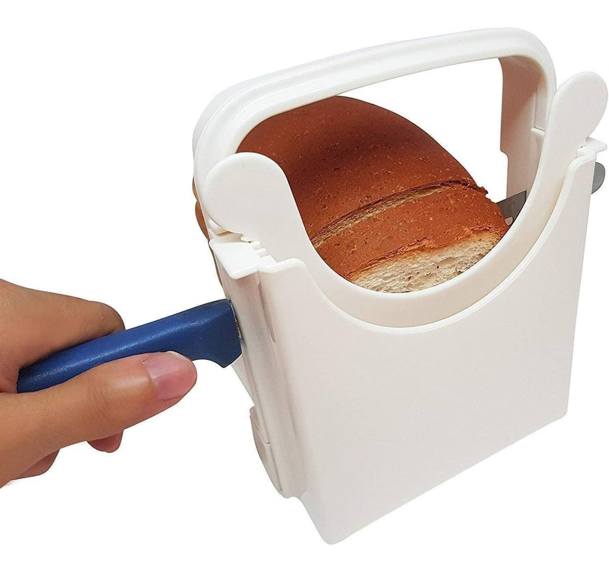 White foldable bread slicer guide with bread loaf and slice guide walls