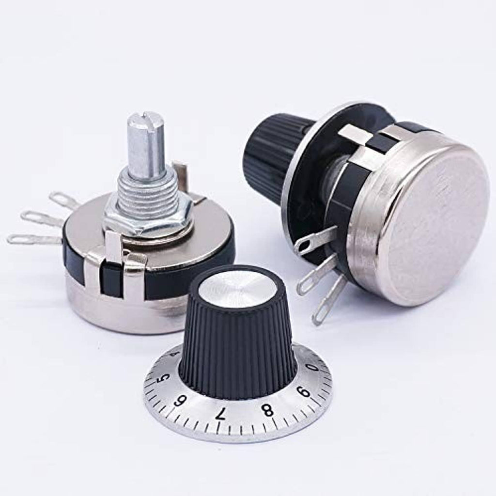 Rotary potentiometers set with ridged black knobs, silver housings, and mounting pins