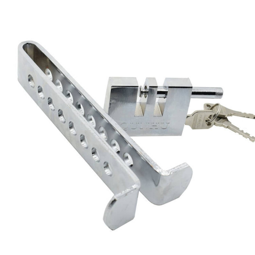 Silver metal pedal anti-theft lock with U-bar and key inserted
