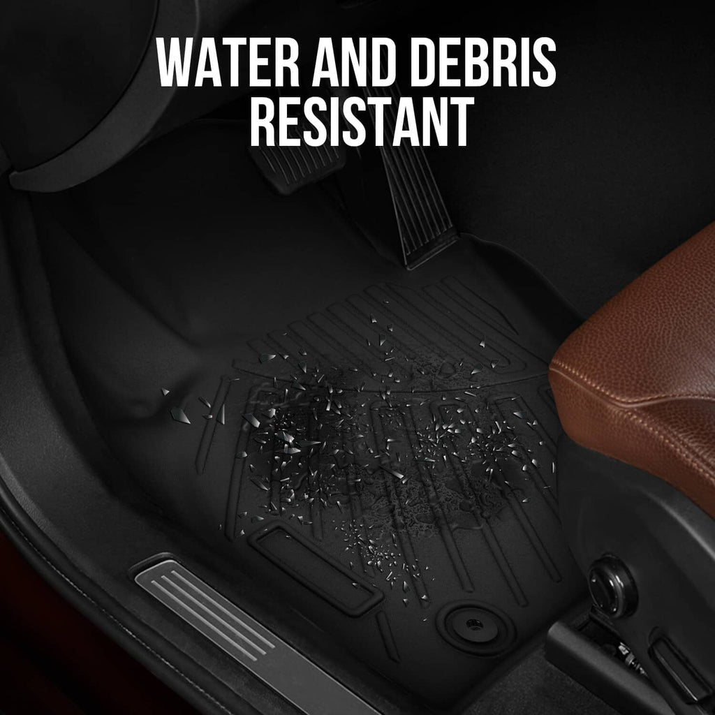 Black floor mat with textured surface and water-and-debris resistant tread pattern