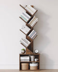 Brown 6-tier tree bookshelf with angled open shelves and lower cabinet storage base