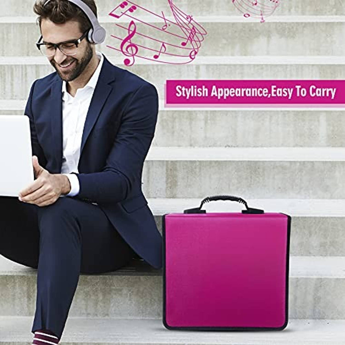 Magenta CD storage case with black trim and carry handle, held while seated