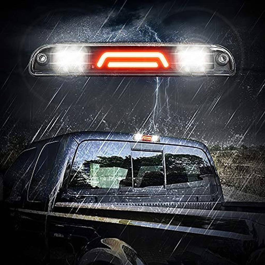 Third brake light with lit red LED bar centered in clear rectangular lens