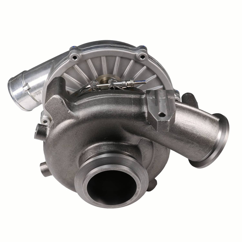 Turbocharger with cast metal compressor housing and side inlet tube