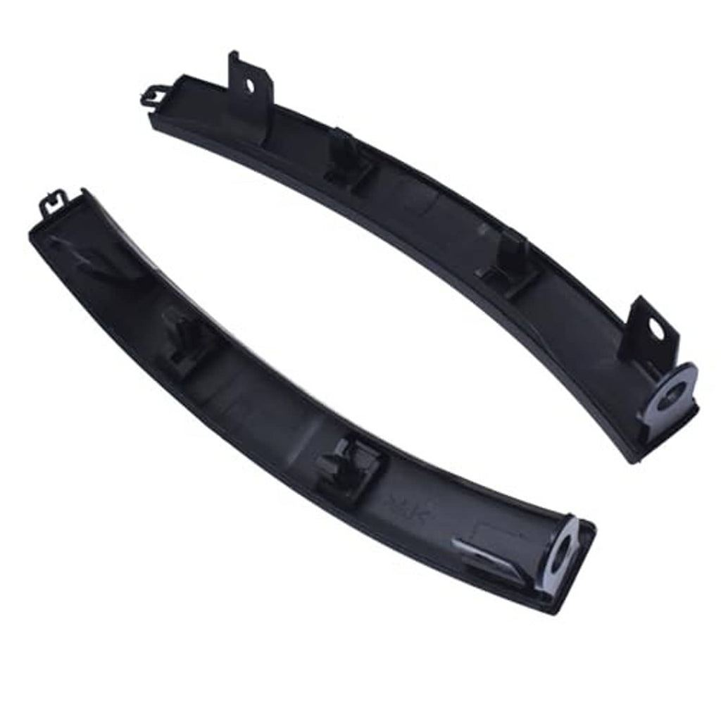 Black plastic front bumper filler trim set with visible clips and molded channels