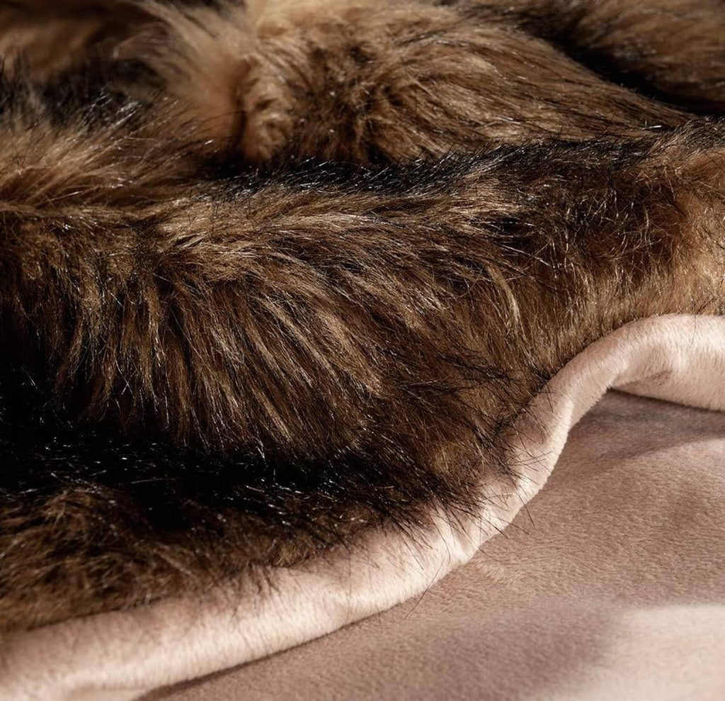 Long-pile faux fur blanket detail, brown with darker tips