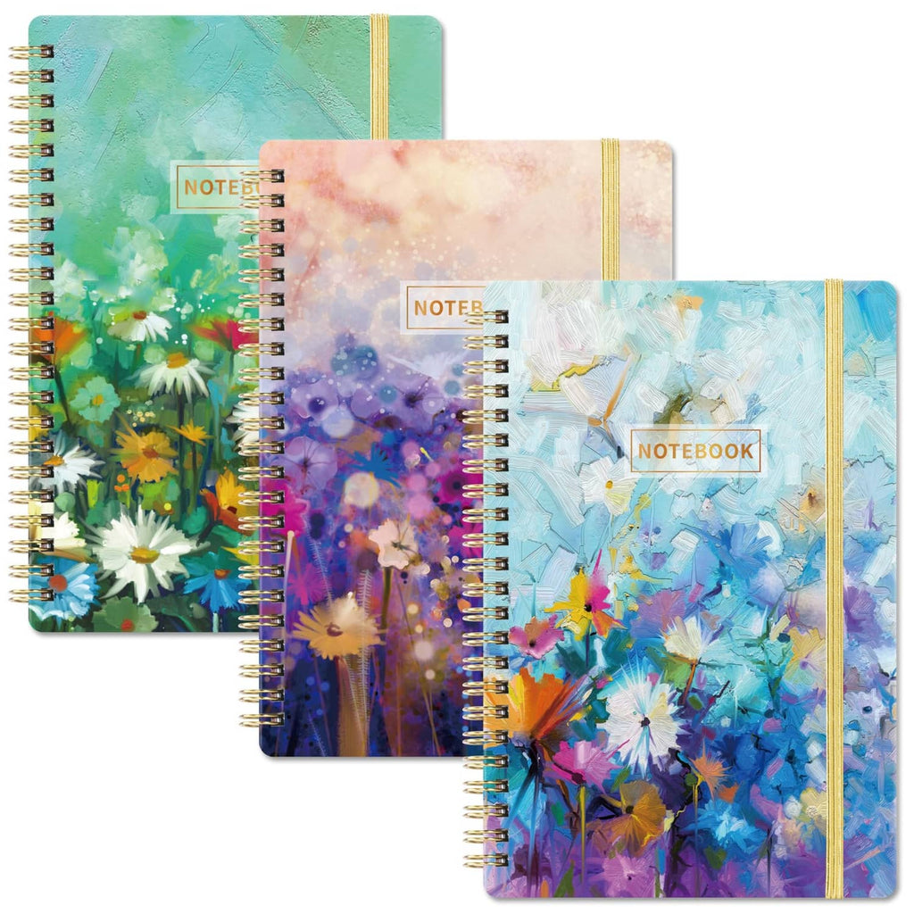 A5 spiral notebook 3-pack with colorful watercolor covers and gold binding coils