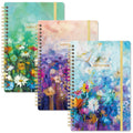 A5 spiral notebook 3-pack with colorful watercolor covers and gold binding coils
