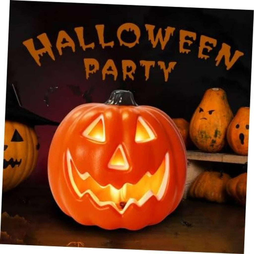 Orange LED jack-o-lantern pumpkin with carved triangle eyes and glowing jagged grin