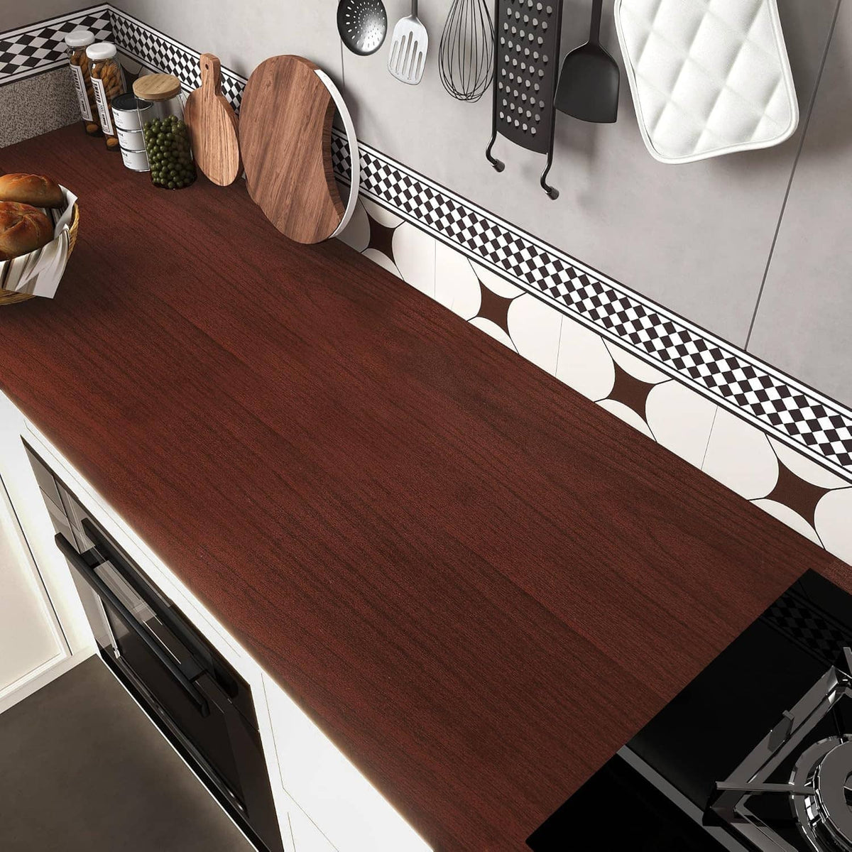 Red-brown cherry wood contact paper on kitchen counter surface, woodgrain plank