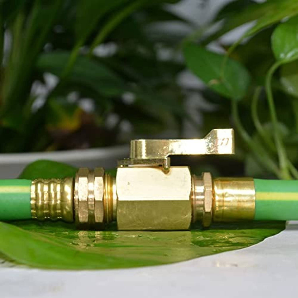 Brass hose shut-off valve on green hose, side view with lever handle and threaded fittings