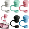 Set of silicone straw cover toppers in white, mint, pink, black, and blue