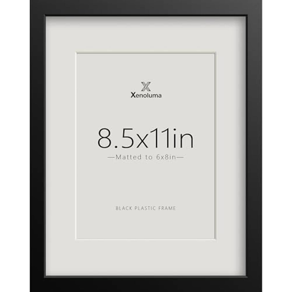 Black plastic picture frame with white mat, centered 8.5x11 display.