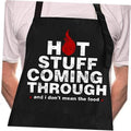 Black chef apron with “HOT STUFF COMING THROUGH” slogan and red flame graphic