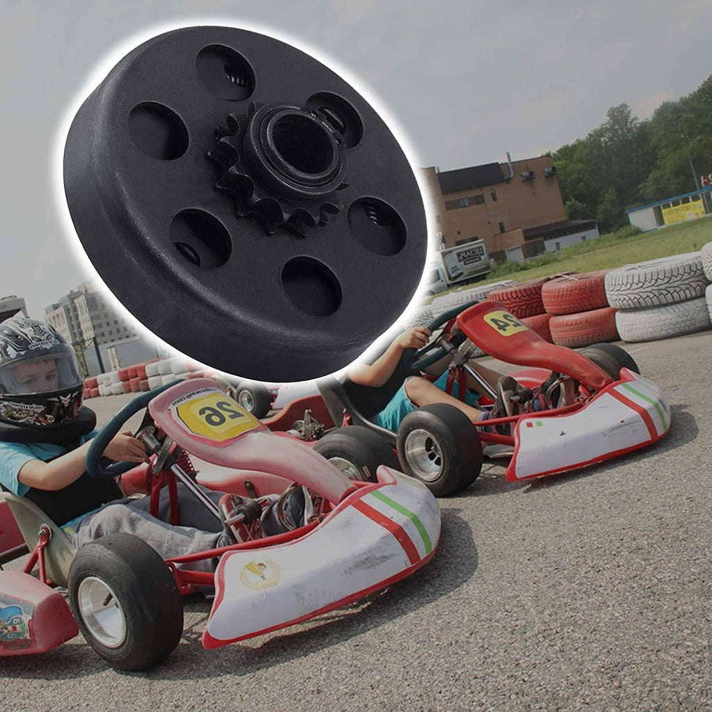 Go-kart clutch plate mounted on red go-kart with black sprocket and chain