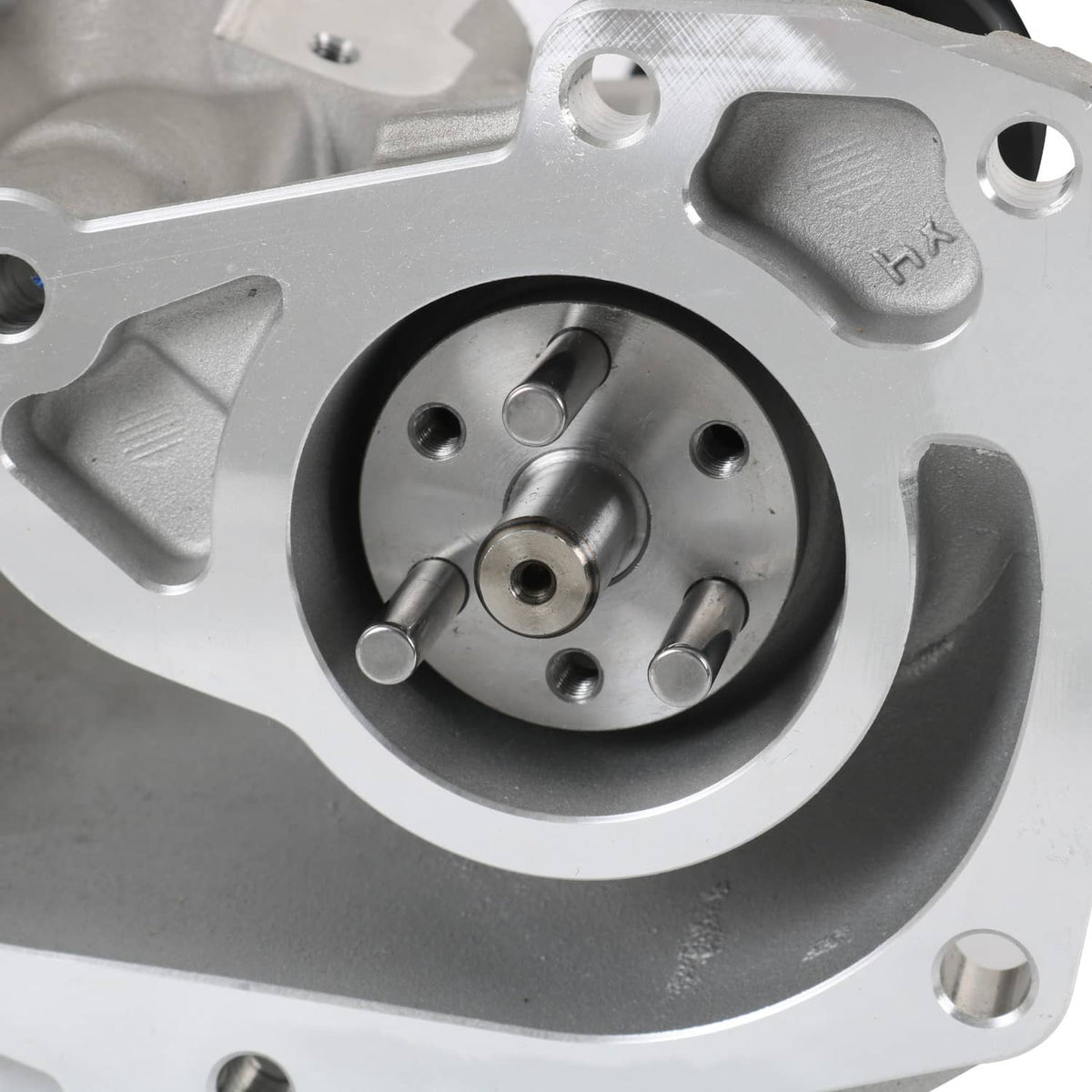 Supercharger snout rebuild kit—pulley hub and circular mounting plate on silver body