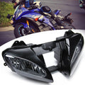 Front headlight assembly with clear lens and black housing, motorcycle headlamp unit
